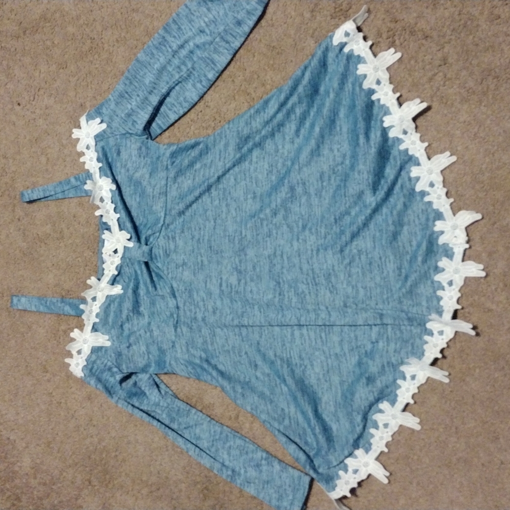 Off the shoulder, denim look blouse.